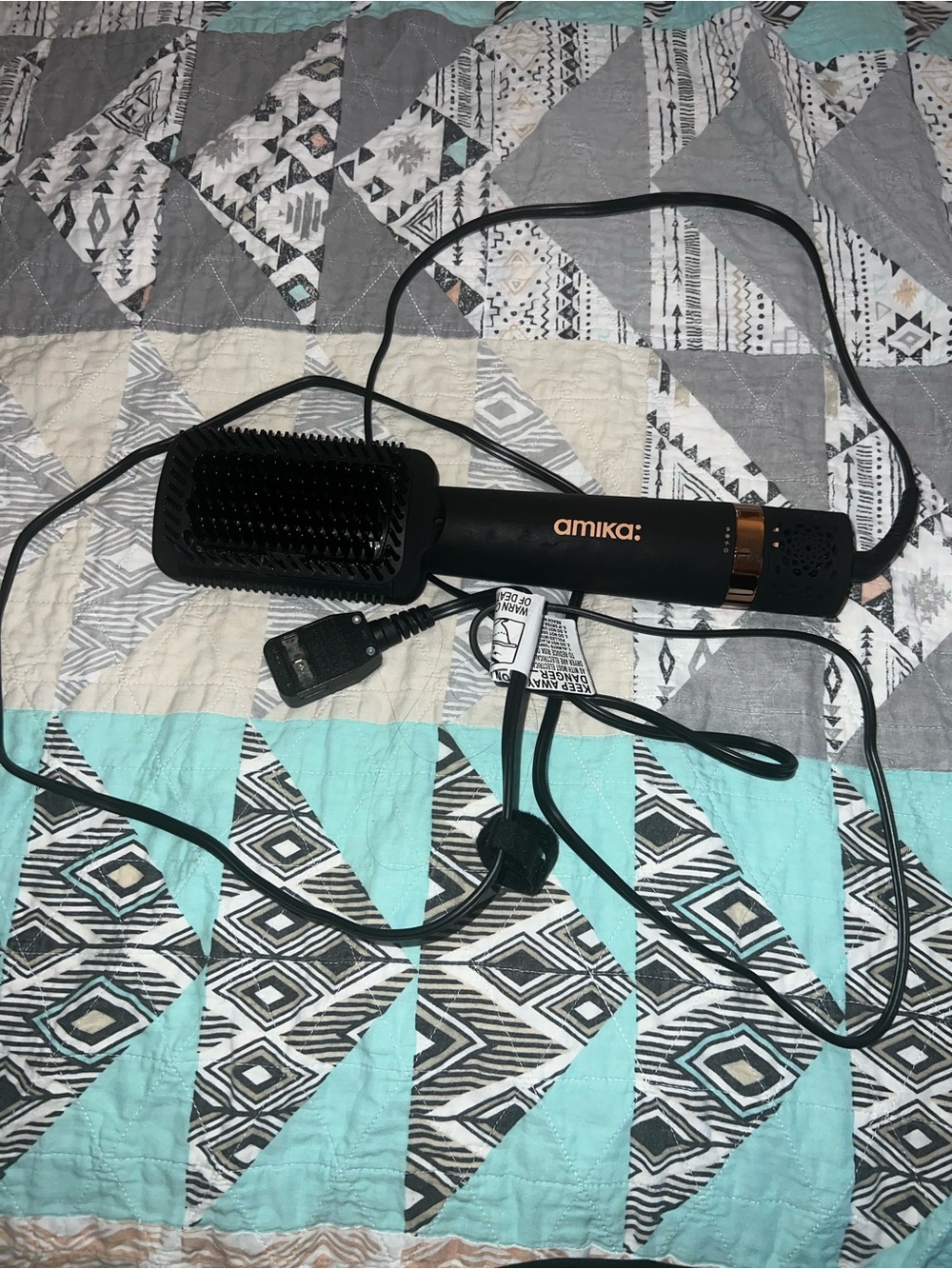amika Black and Rose Gold Heated Brush Styler